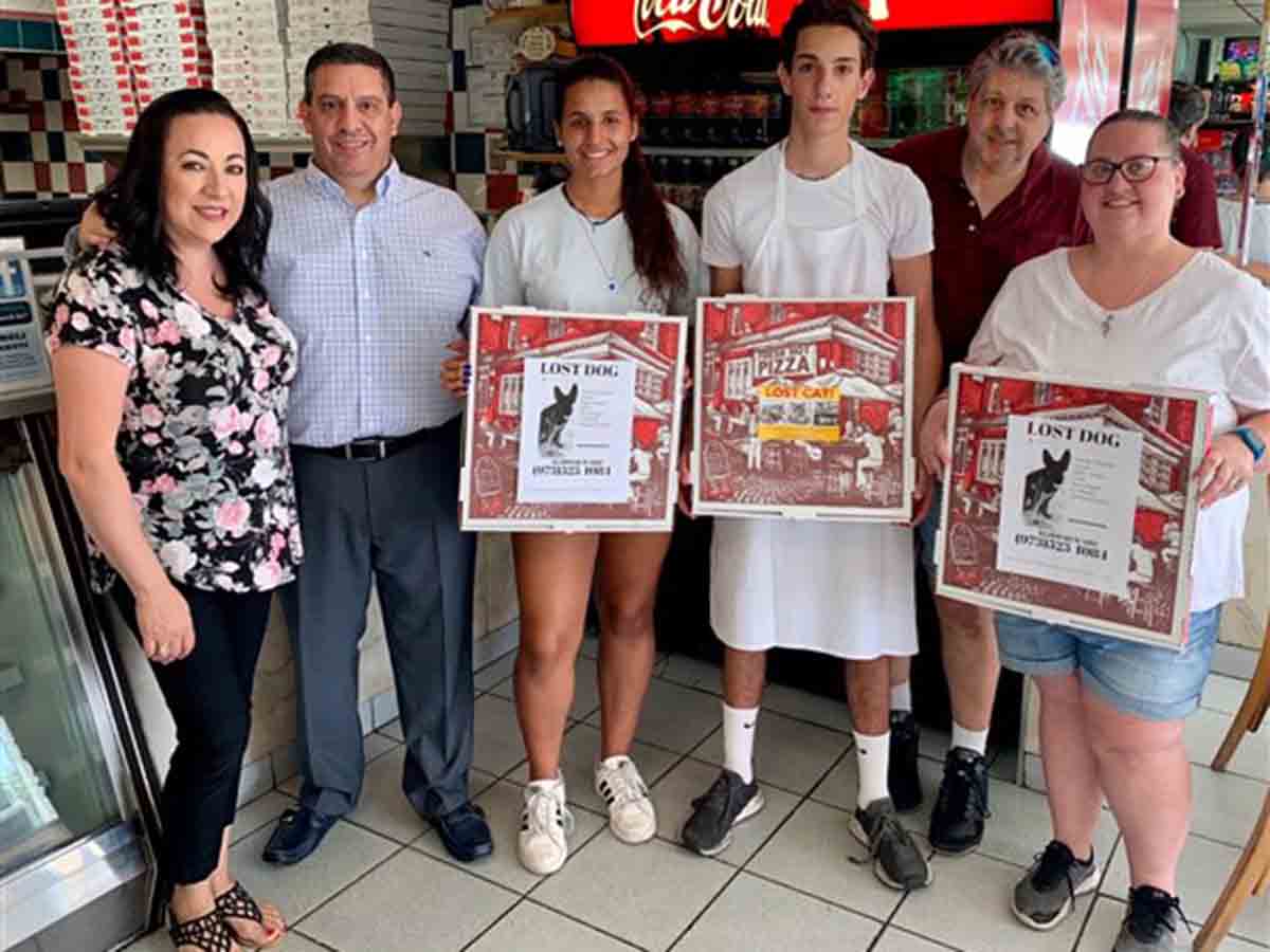 Pizzería usa sus cajas para encontrar mascotas perdidas